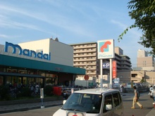 万代春日野道店